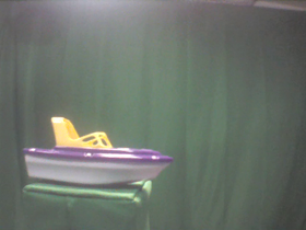 0 Degrees _ Picture 9 _ Purple and Yellow Toy Boat.png